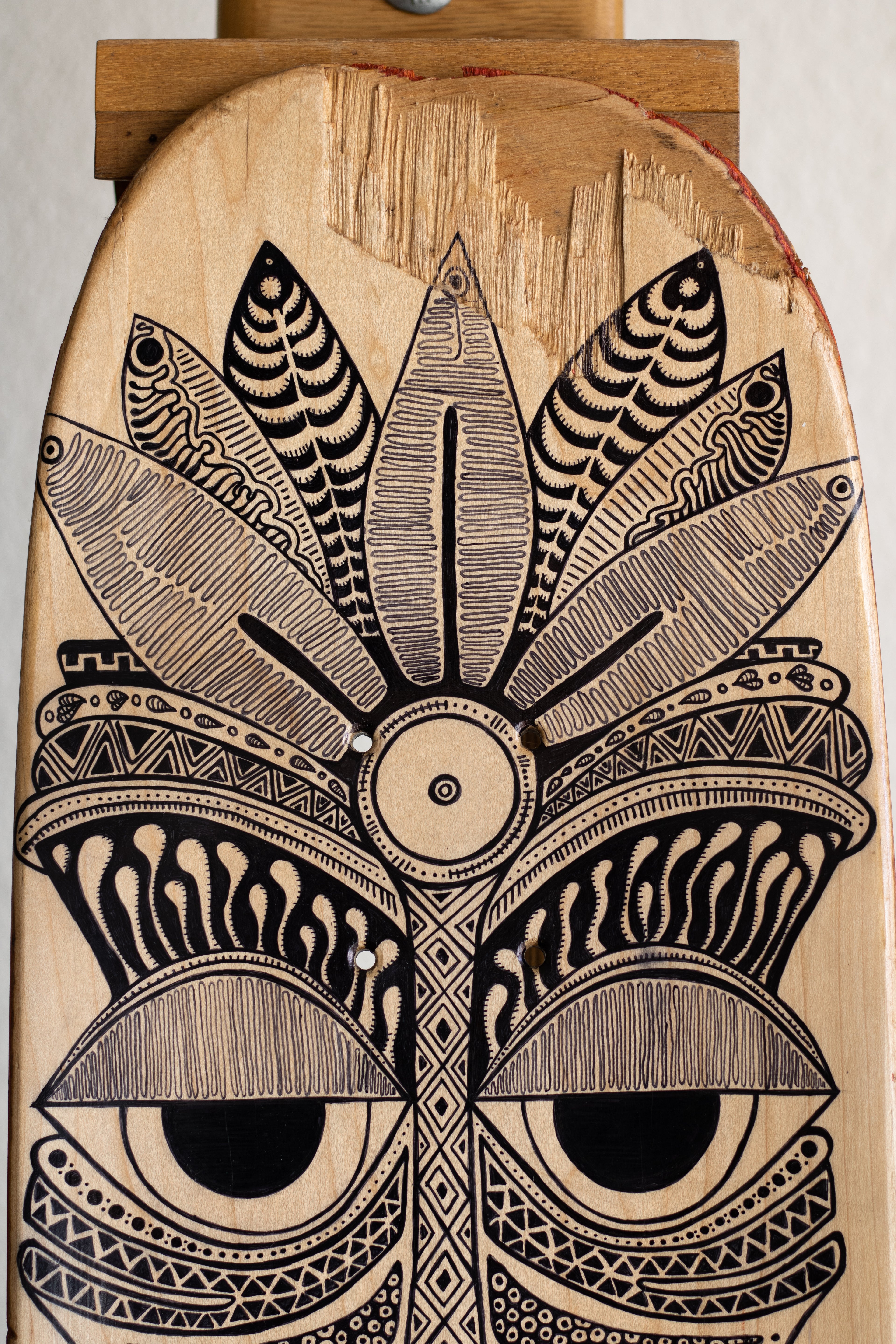 Fine Liner & Permanent Marker Tribal Design on up-cycled skateboard art. Original Artwork by Cape Town based artist Groovy Notion Art. Tikki Art.